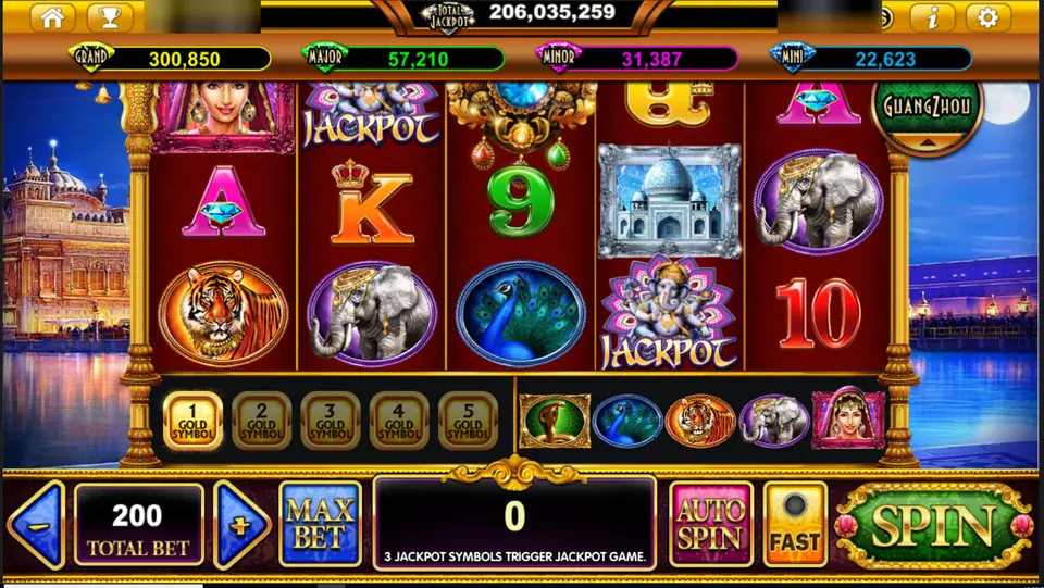 The Taj Majestic on Live22: Ganesha Jackpot tiles, a Taj Mahal and five Gold Symbol counters under the reels, total bet 200, player ID and balance blurred